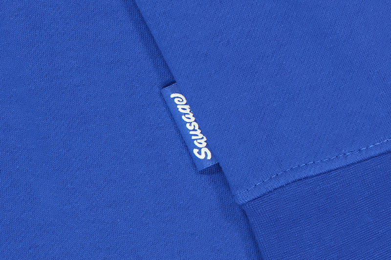 blue hoodie closeup on label